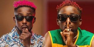 “Poverty No Dey Die By Fire, Go Find Update”-Rapper, Erigga To Fans