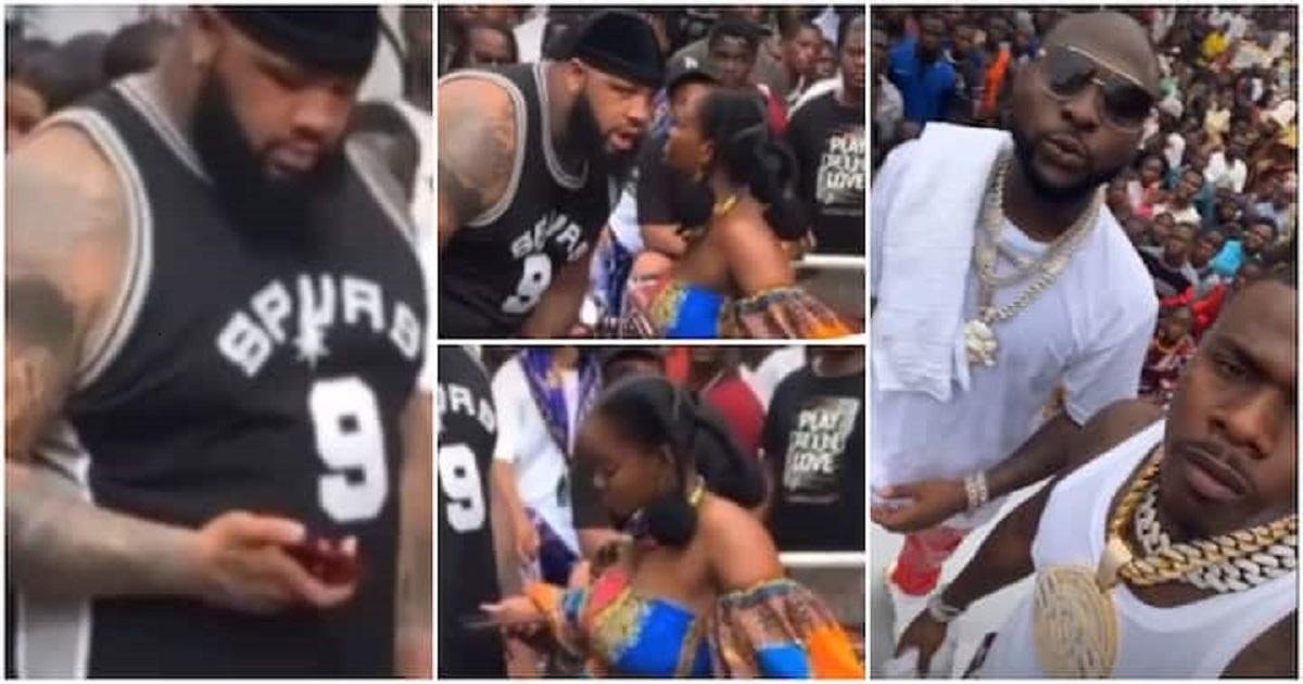 Video: DaBaby’s Bodyguard Spotted Collecting Phone Number From A Babe in Lagos Island