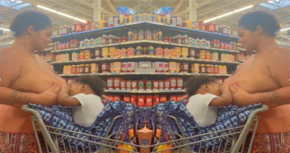 Video: Lady causes a debate online over the way she publicly breastfeeds her child